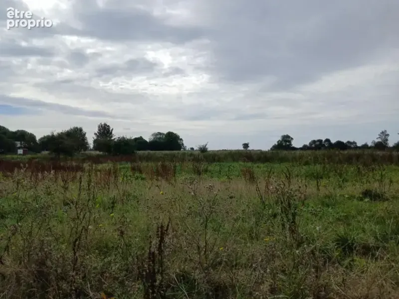 Photo Terrain à Manerbe au prix de 79 900€