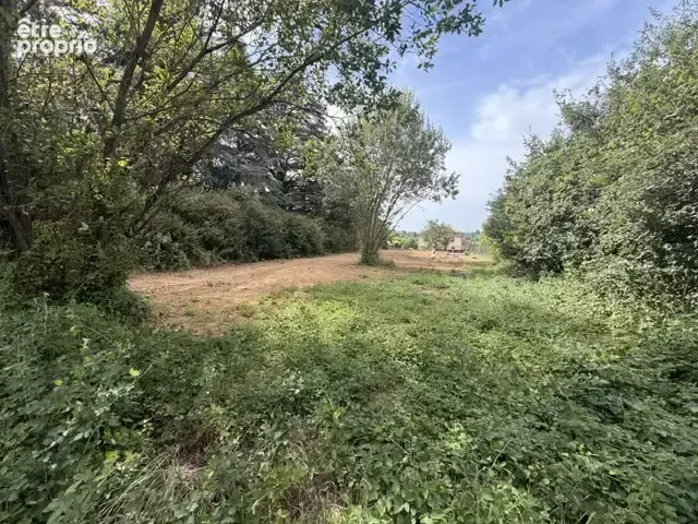 Photo Terrain à Genay au prix de 265 000€