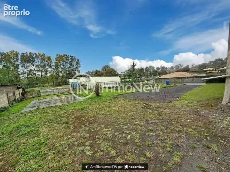 Photo Terrain à La Haye-Pesnel au prix de 28 000€