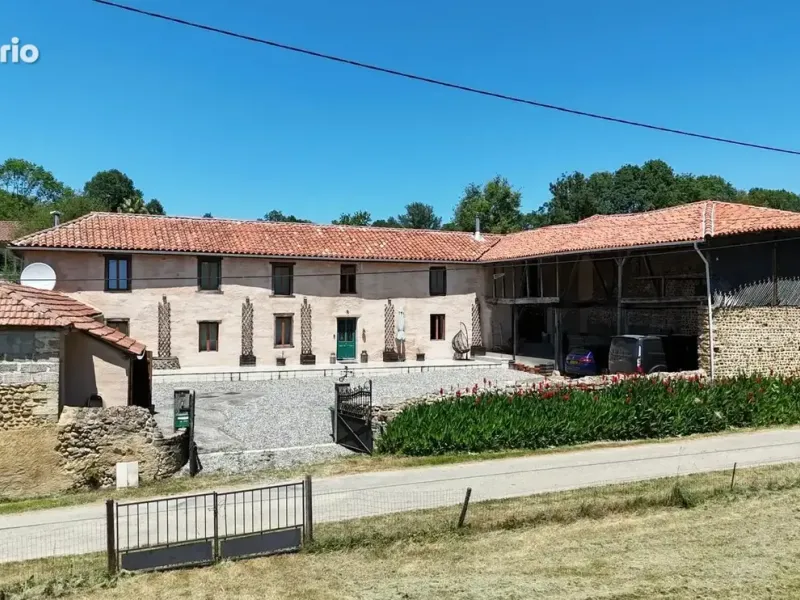 Front façade of this beautifully renovated farmhouse in Arné