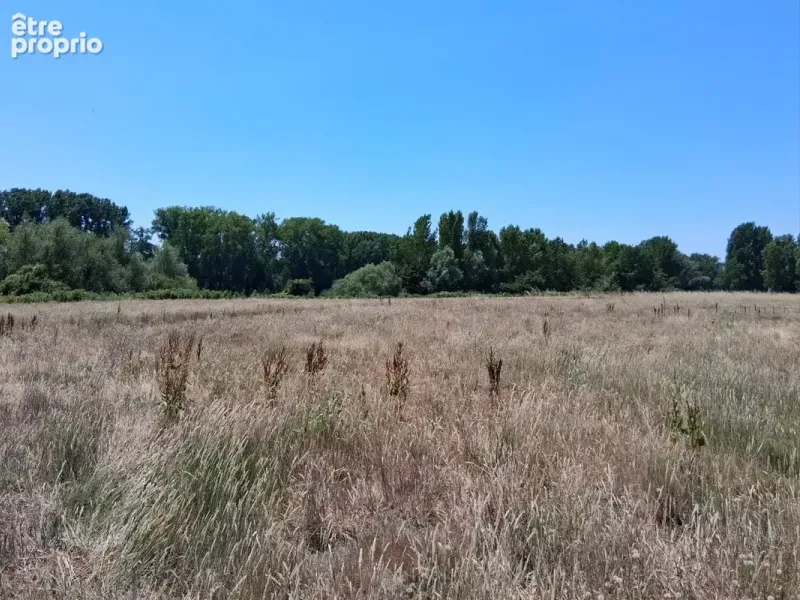 Photo Terrain à Creysse au prix de 35 000€