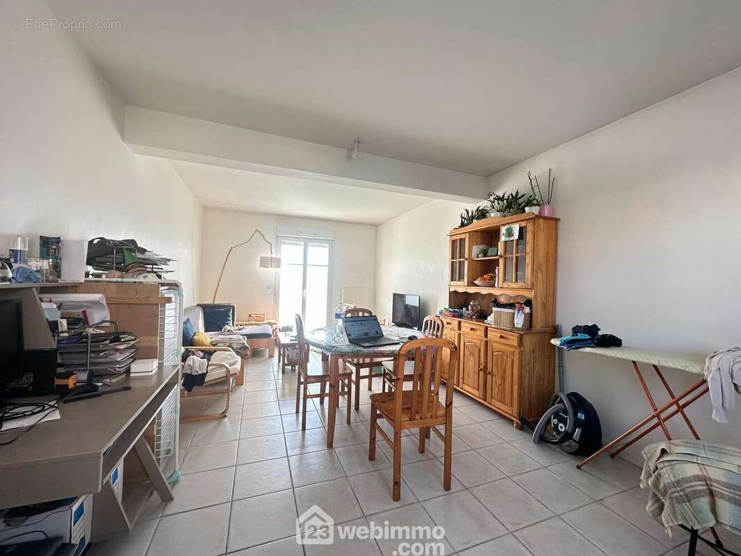 Un séjour lumineux de 27 m² avec ... - Maison à PANCY-COURTECON