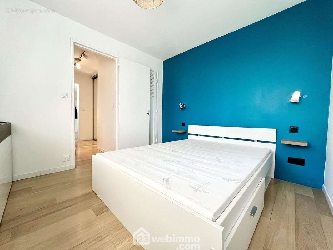 Chambre 1 avec un espace bureau/dressing de 9 m² - Appartement à VANVES