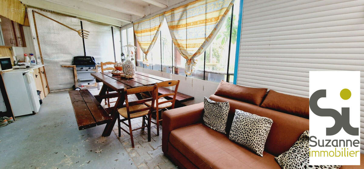 cuisine d&#039;été dans la véranda au 1er étage - Maison à RIVES