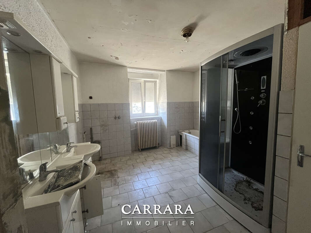 Maison à SERVIGNY-LES-RAVILLE