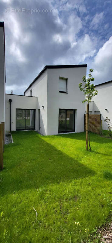 Maison à GRAND-CHAMP