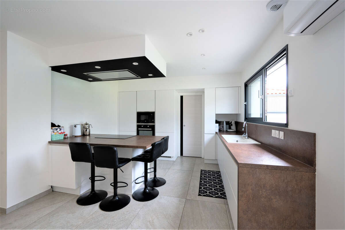 Maison à ROMANS-SUR-ISERE