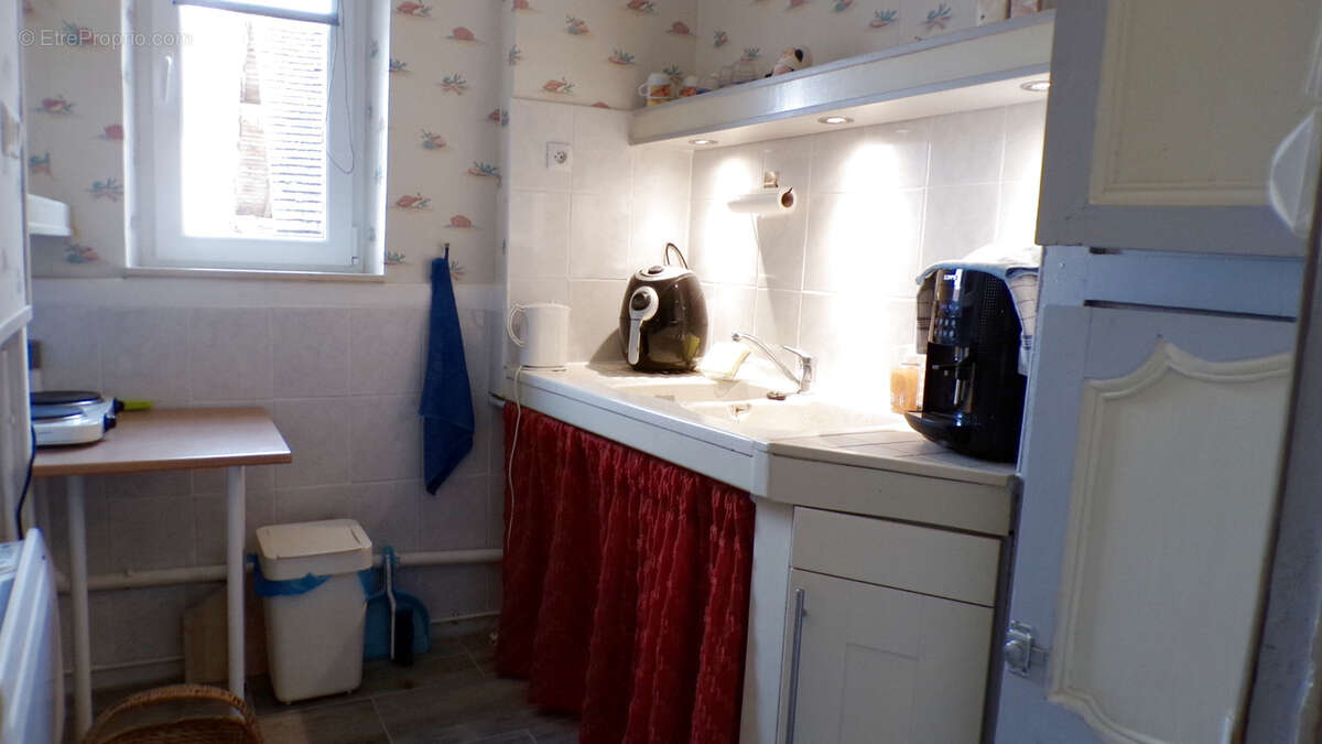 Maison à AINAY-LE-CHATEAU