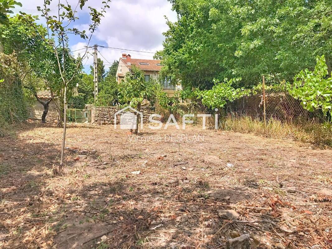 Photo 1 - Terrain à SAINT-ETIENNE-DE-GOURGAS