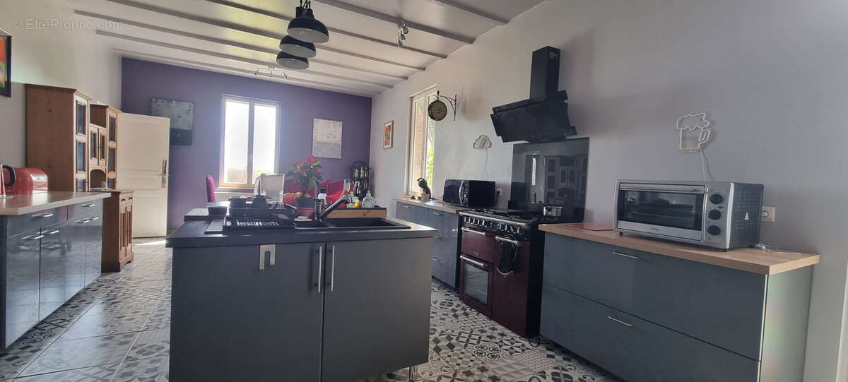 Maison à CASTELNAU-MONTRATIER