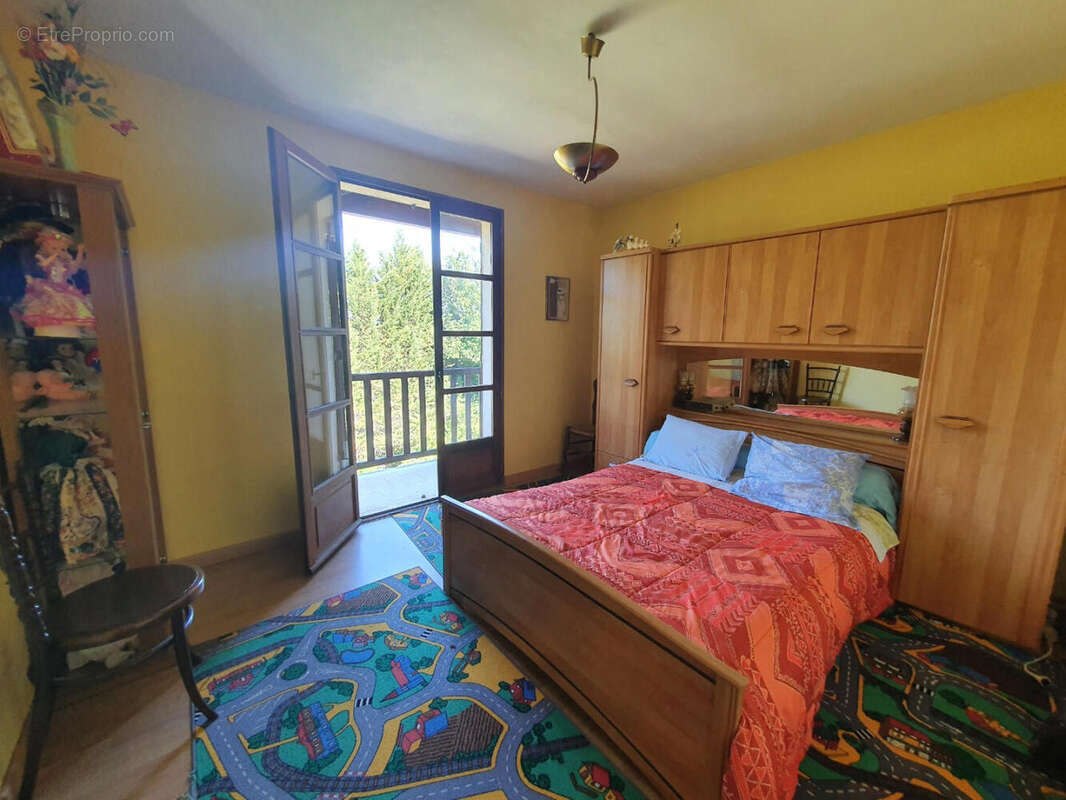 RDC chambre 1 - Maison à CAHORS