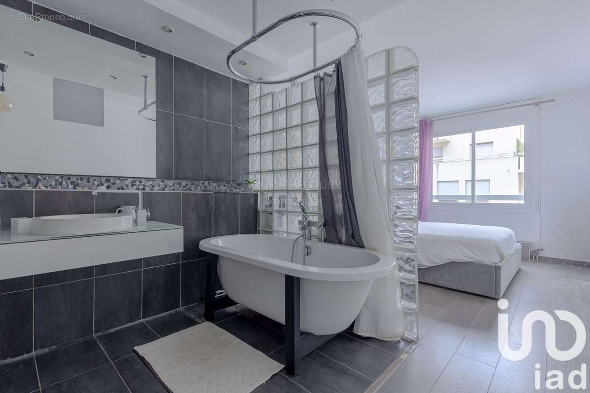 Photo 6 - Appartement à COURBEVOIE