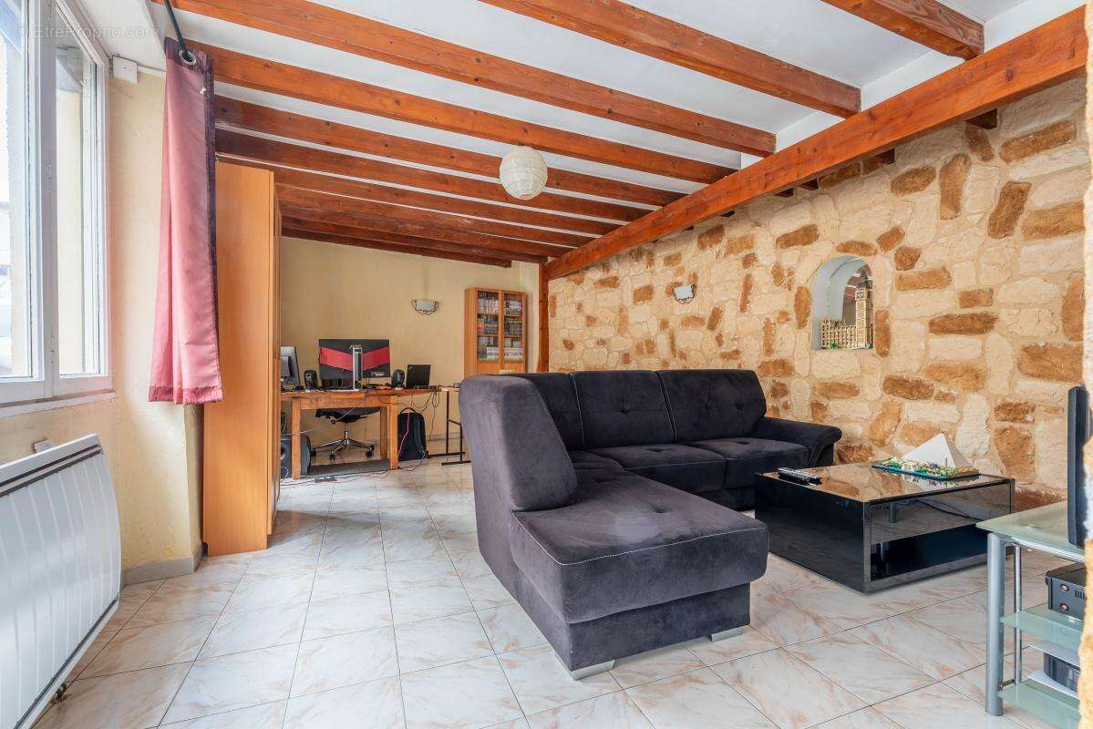 Maison à SOURCIEUX-LES-MINES