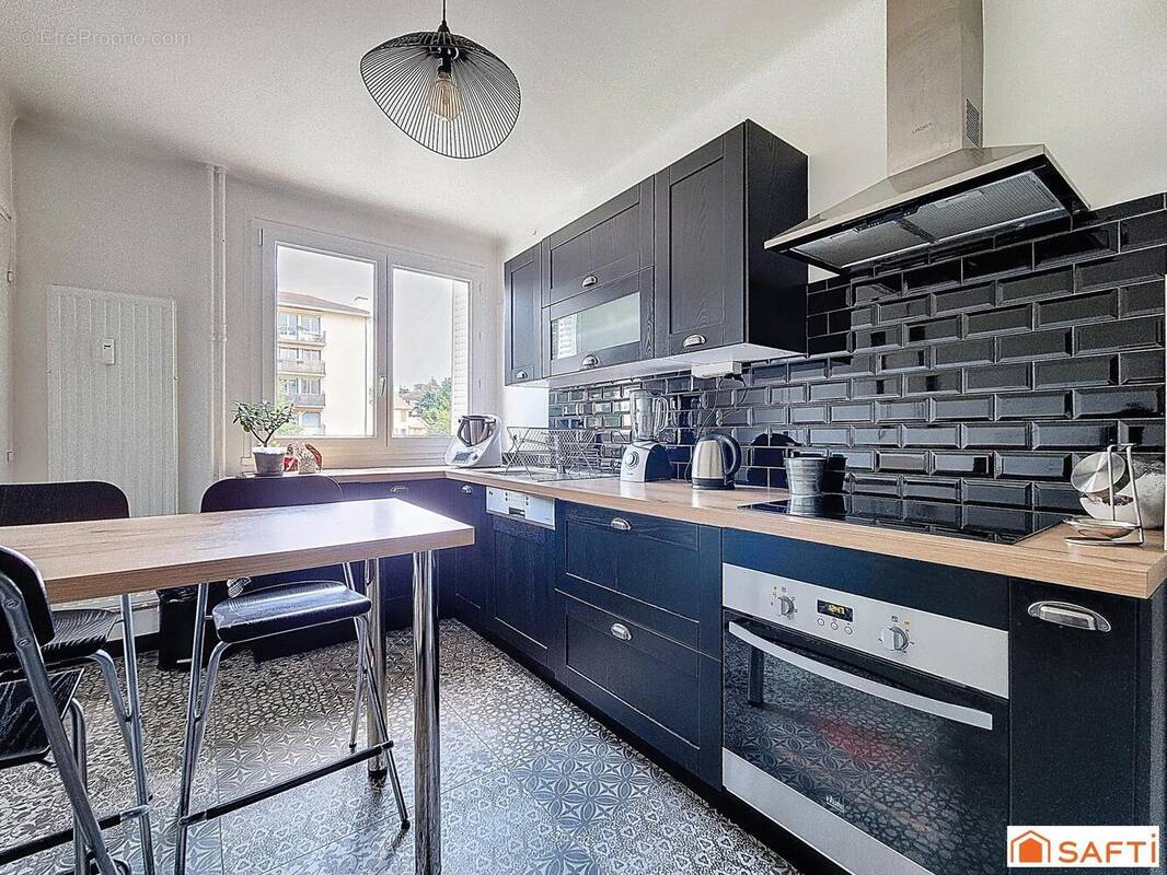 Photo 1 - Appartement à TASSIN-LA-DEMI-LUNE