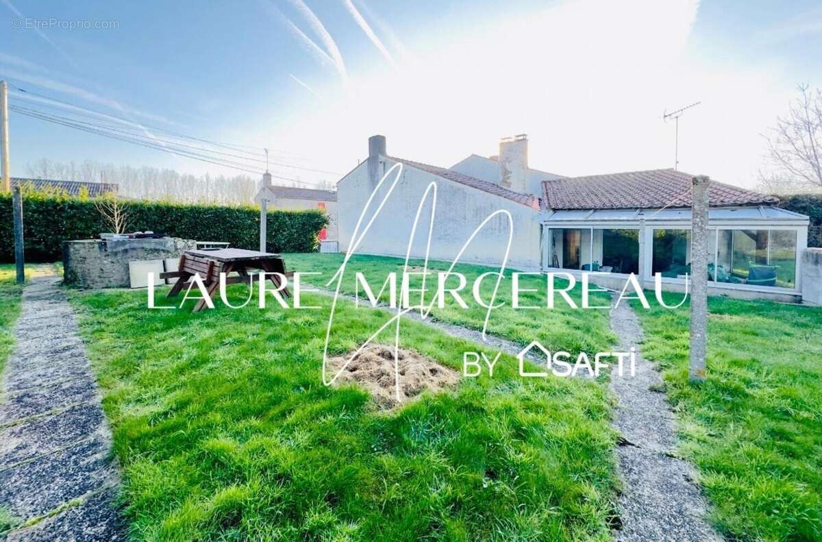 Photo 2 - Maison à SAINT-ETIENNE-DU-BOIS