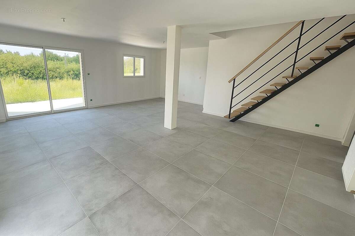 Pièce de vie - Maison à CHATEAUGIRON