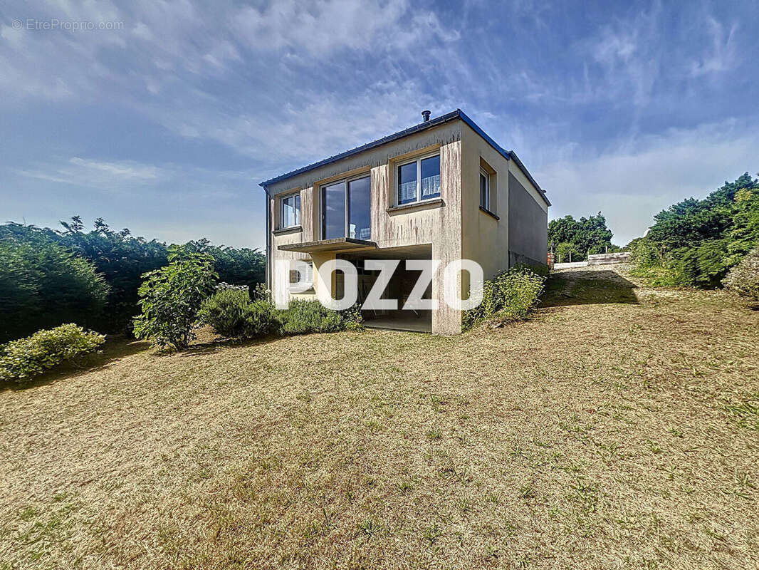 Maison à JUVIGNY-LE-TERTRE