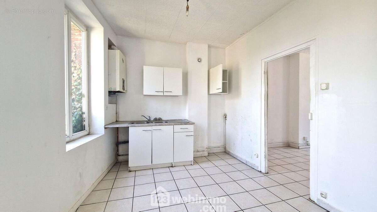 Une cuisine indépendante de 11 m² à aménager selon vos goûts - Maison à LAON