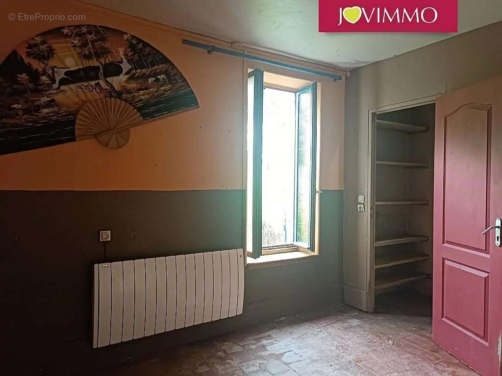 Maison à AINAY-LE-CHATEAU