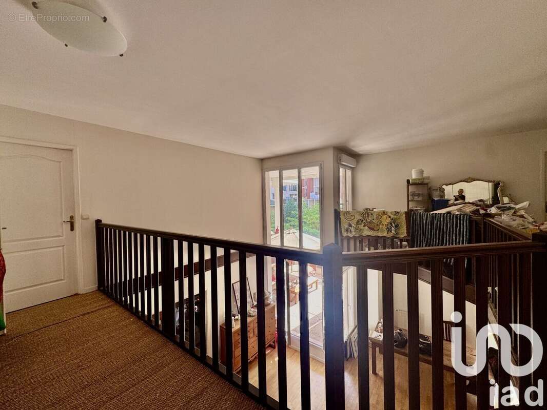 Photo 4 - Appartement à COURBEVOIE