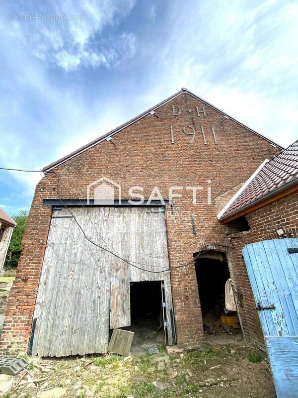 Photo 1 - Maison à LOUVIGNIES-QUESNOY