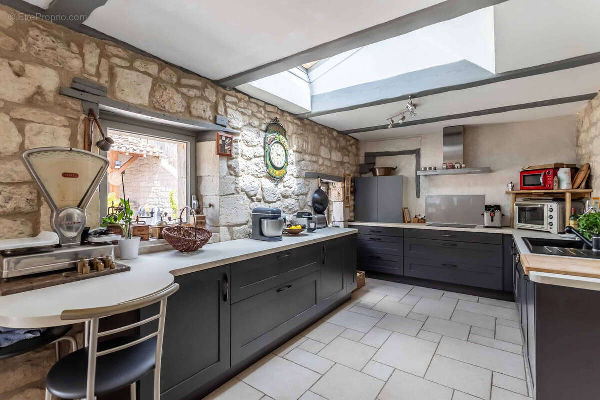 Maison à CASTELNAU-MONTRATIER