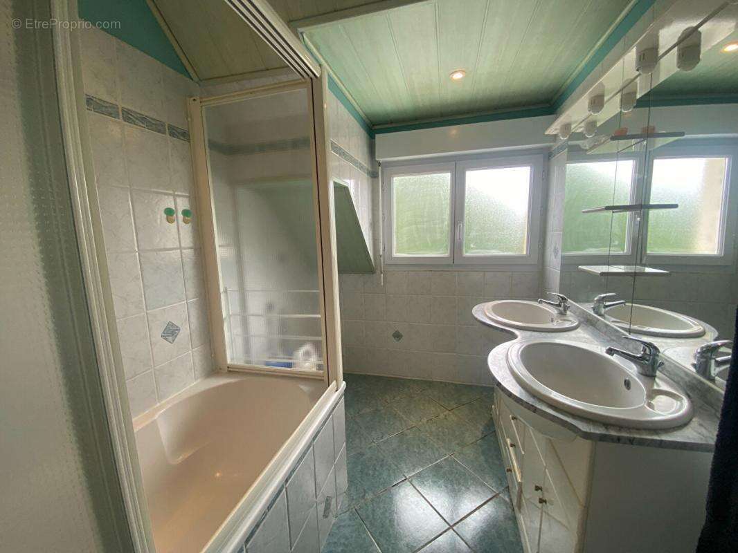 Maison à AGON-COUTAINVILLE