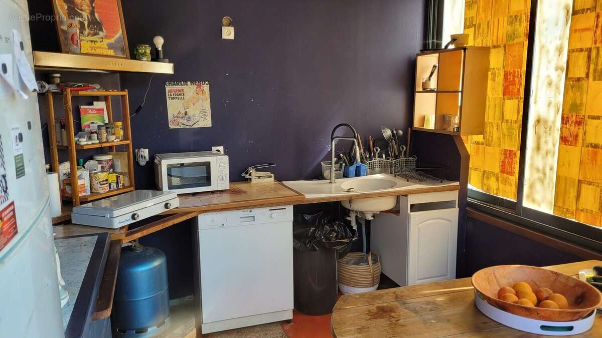 Cuisine/véranda - Maison à SAINT-MANDE-SUR-BREDOIRE