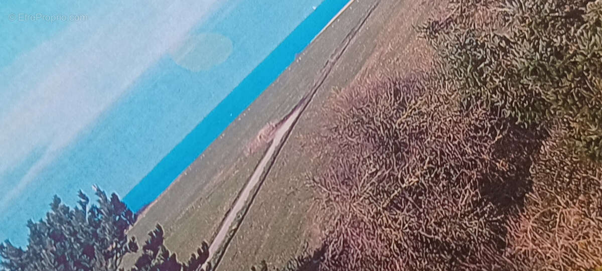 Terrain à SAINT-LAURENT-SUR-MER