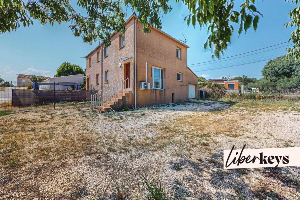 Maison à SAINT-JULIEN-LES-ROSIERS
