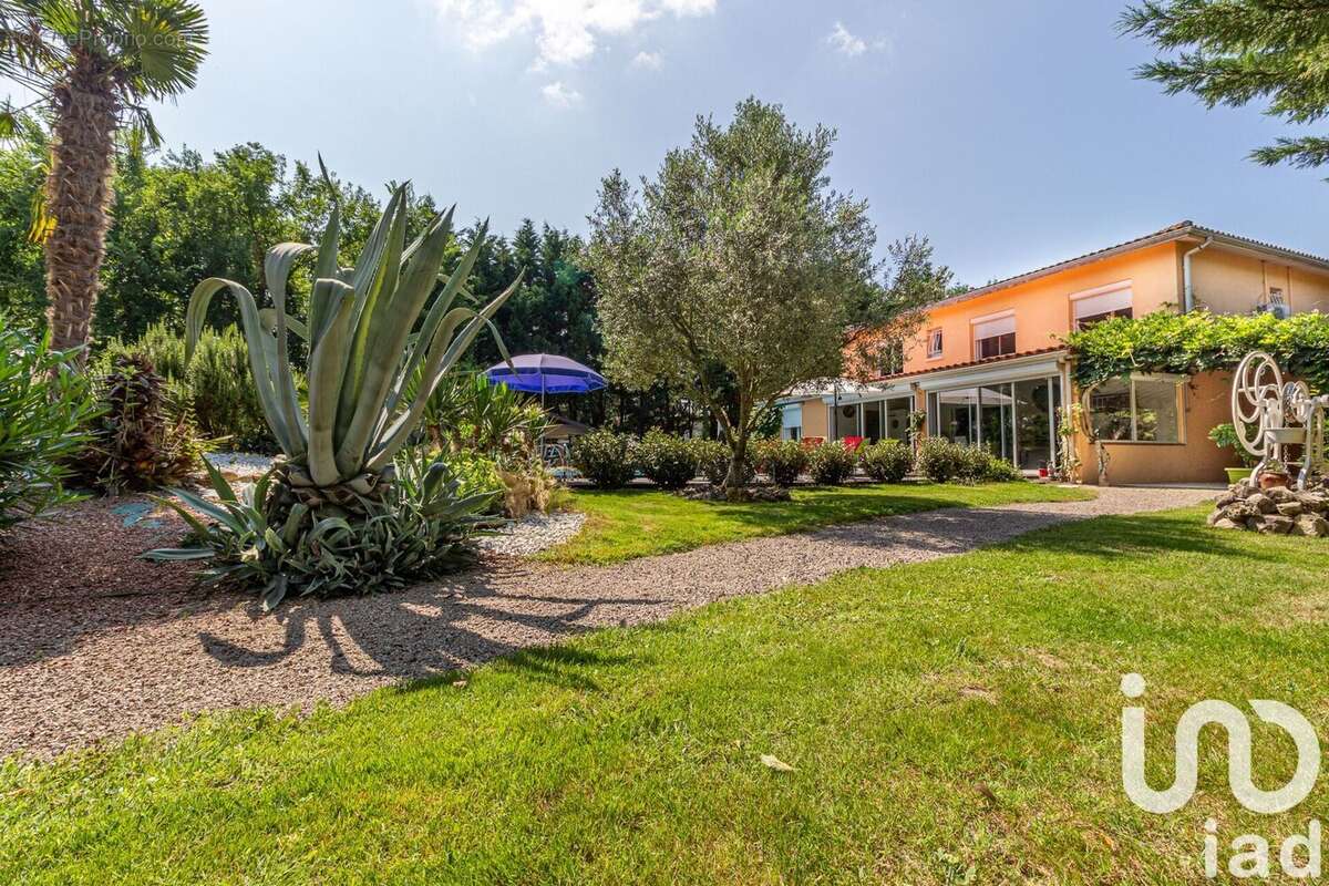 Photo 2 - Maison à SAINT-ETIENNE-DE-TULMONT