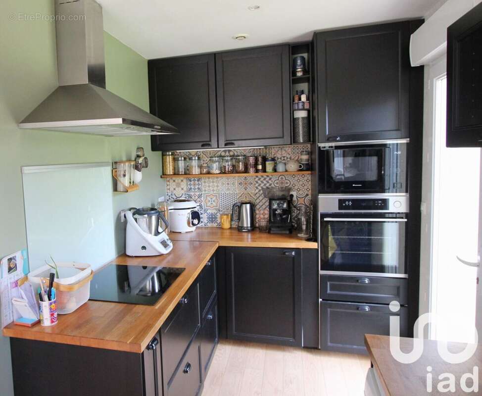 Photo 2 - Maison à CORMELLES-LE-ROYAL