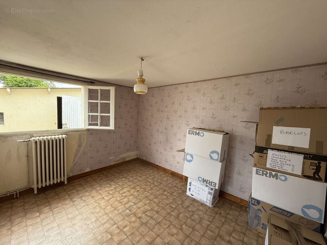 Maison à JUVIGNY-LE-TERTRE