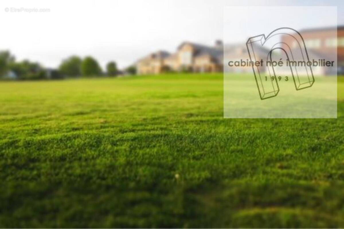 Photo 1 - Terrain à LE PAVILLON-SAINTE-JULIE