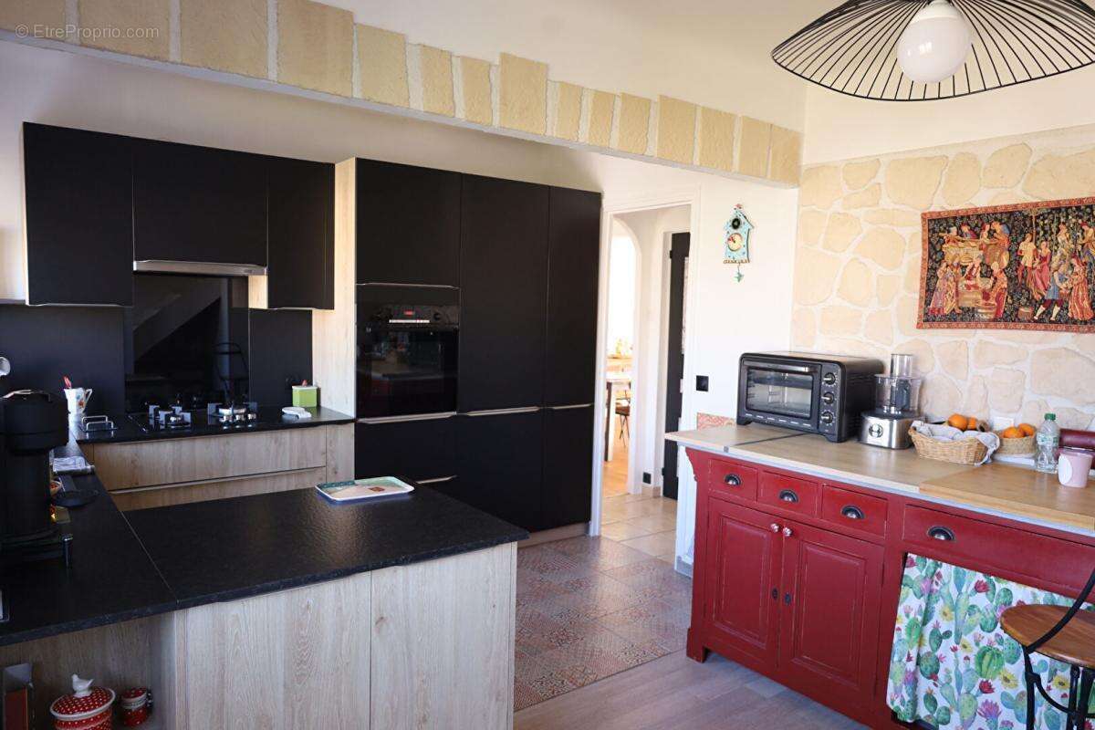 Maison à AUBERGENVILLE