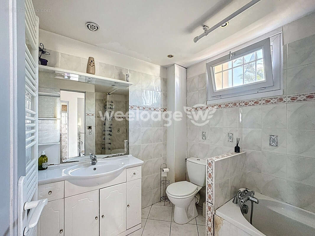 Maison à CHANTELOUP-LES-VIGNES