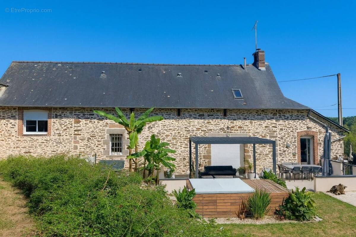 Photo 1 - Maison à LA HAIE-TRAVERSAINE