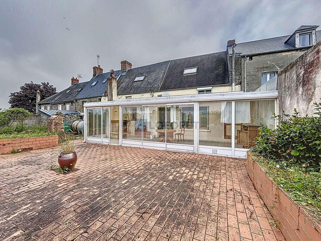 Maison à CONDE-SUR-NOIREAU