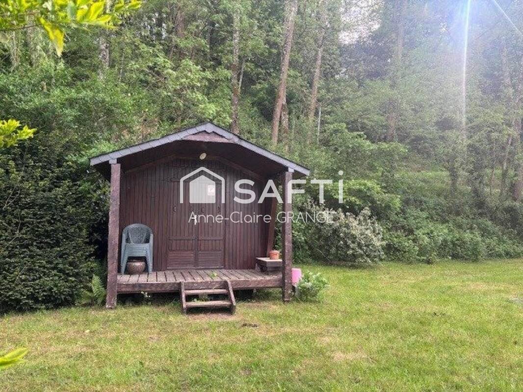 Photo 1 - Terrain à SAINT-LEONARD-DES-BOIS