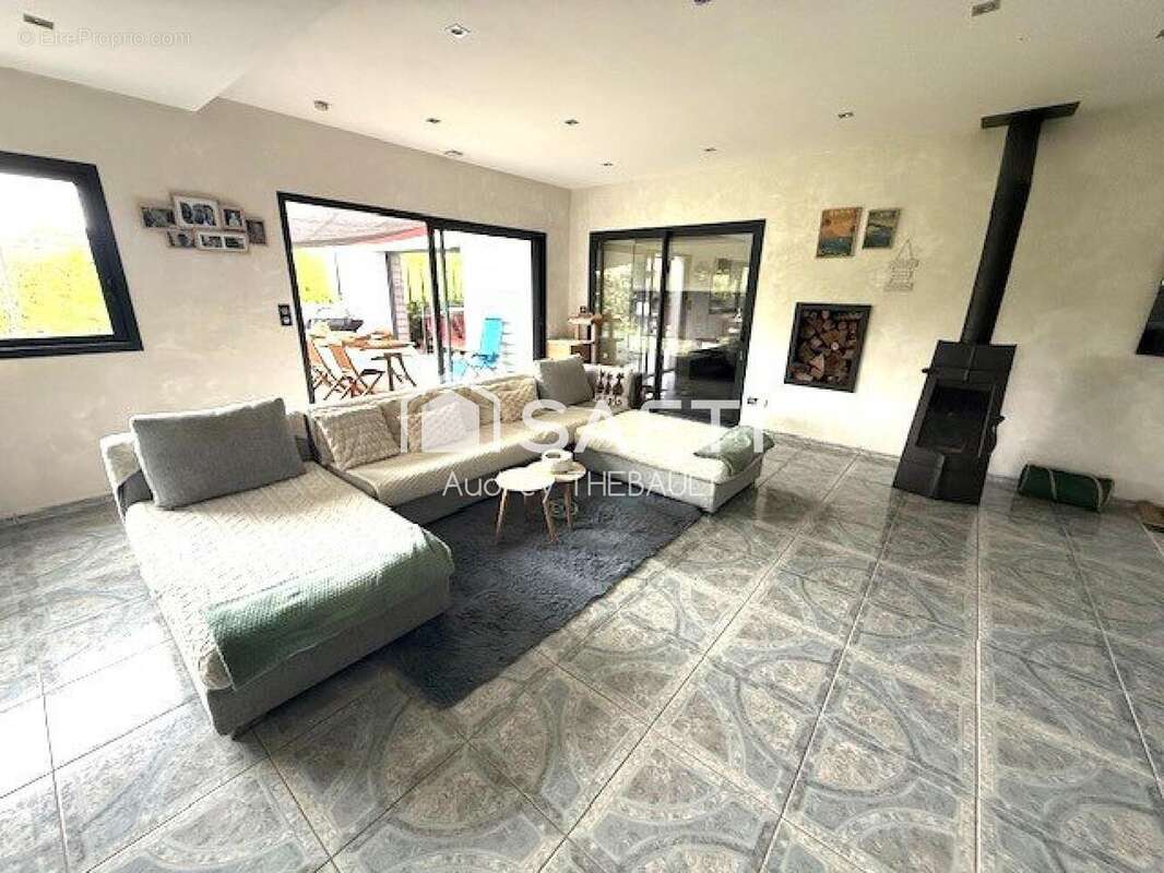 Photo 2 - Maison à RANG-DU-FLIERS