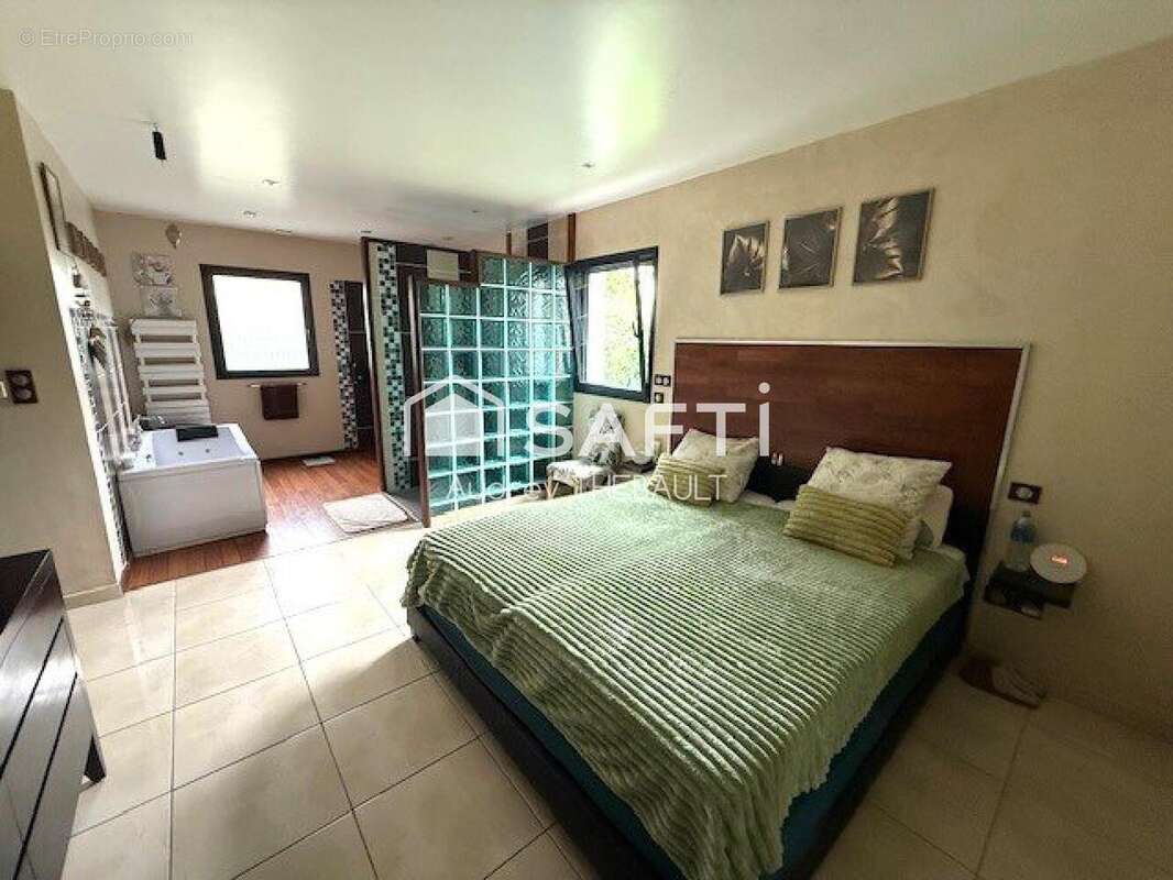 Photo 5 - Maison à RANG-DU-FLIERS