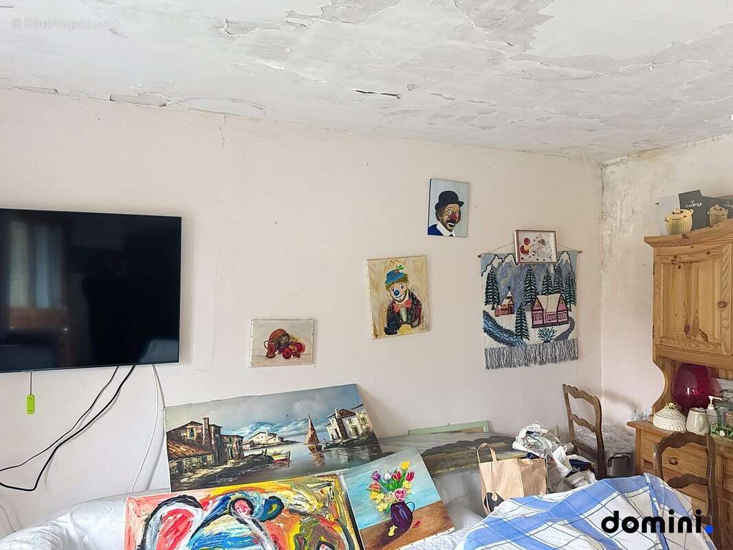 Maison à SAINT-SYMPHORIEN-DE-MARMAGNE