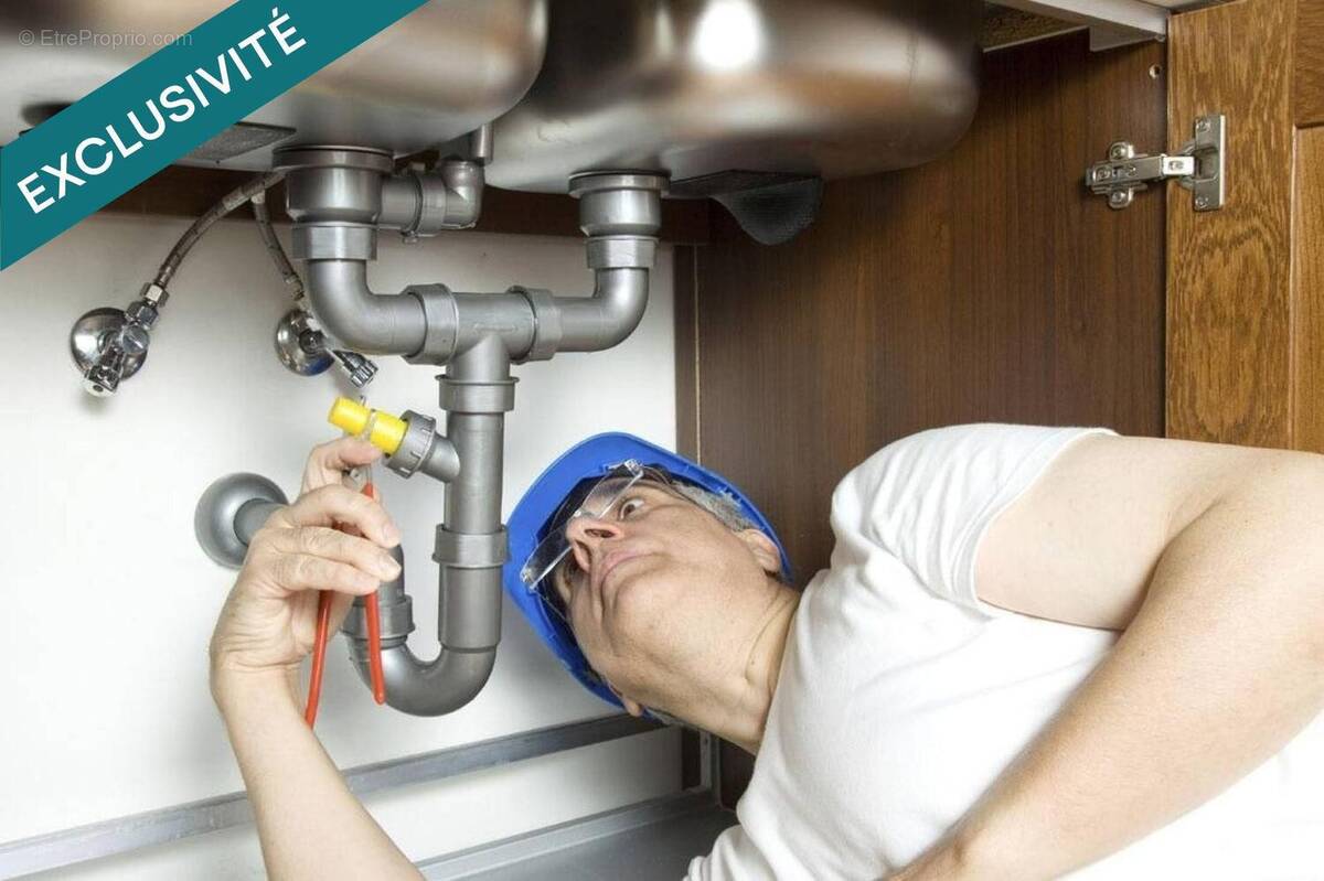 Photo 1 - Commerce à PARIS-7E