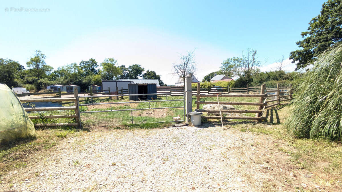 Terrain à RAUVILLE-LA-PLACE