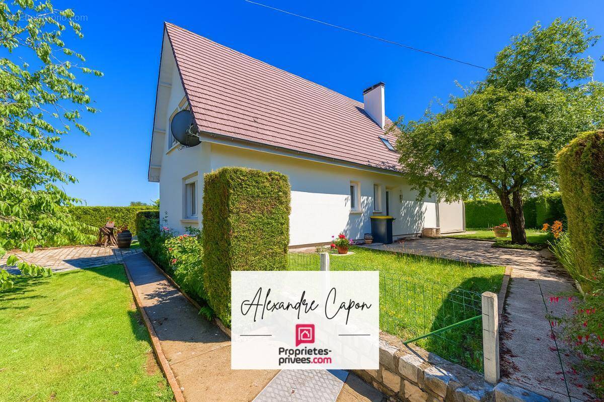 Maison à SAINT-OUEN-DE-THOUBERVILLE