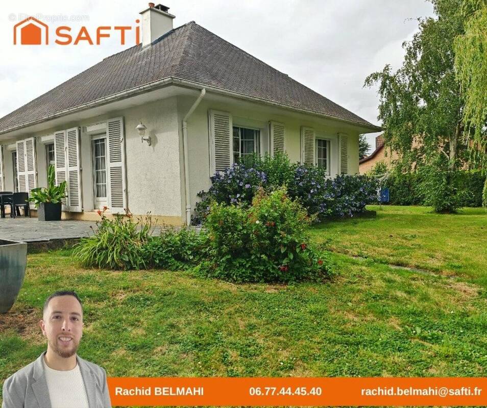 Photo 1 - Maison à SAINT-LEONARD