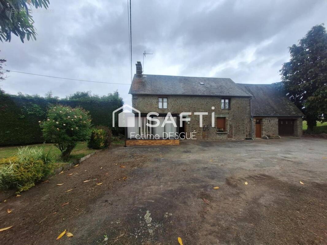 Photo 1 - Maison à JUVIGNY-LE-TERTRE