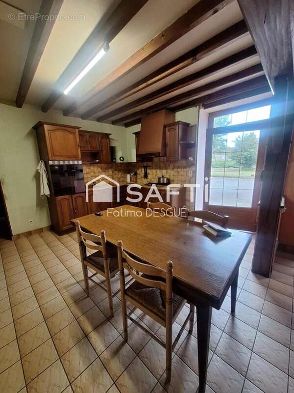 Photo 4 - Maison à JUVIGNY-LE-TERTRE