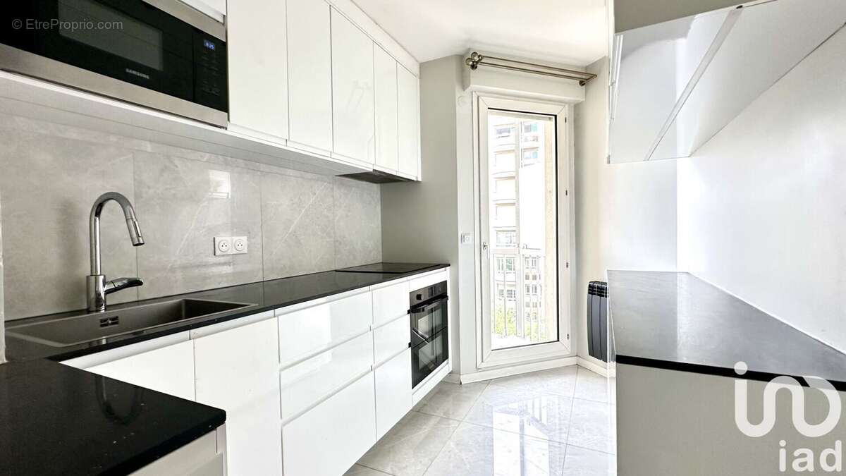 Photo 4 - Appartement à COURBEVOIE