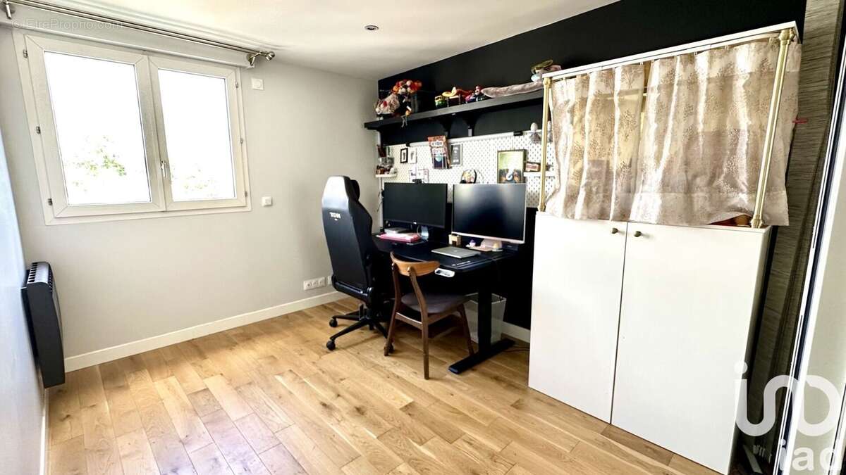 Photo 9 - Appartement à COURBEVOIE